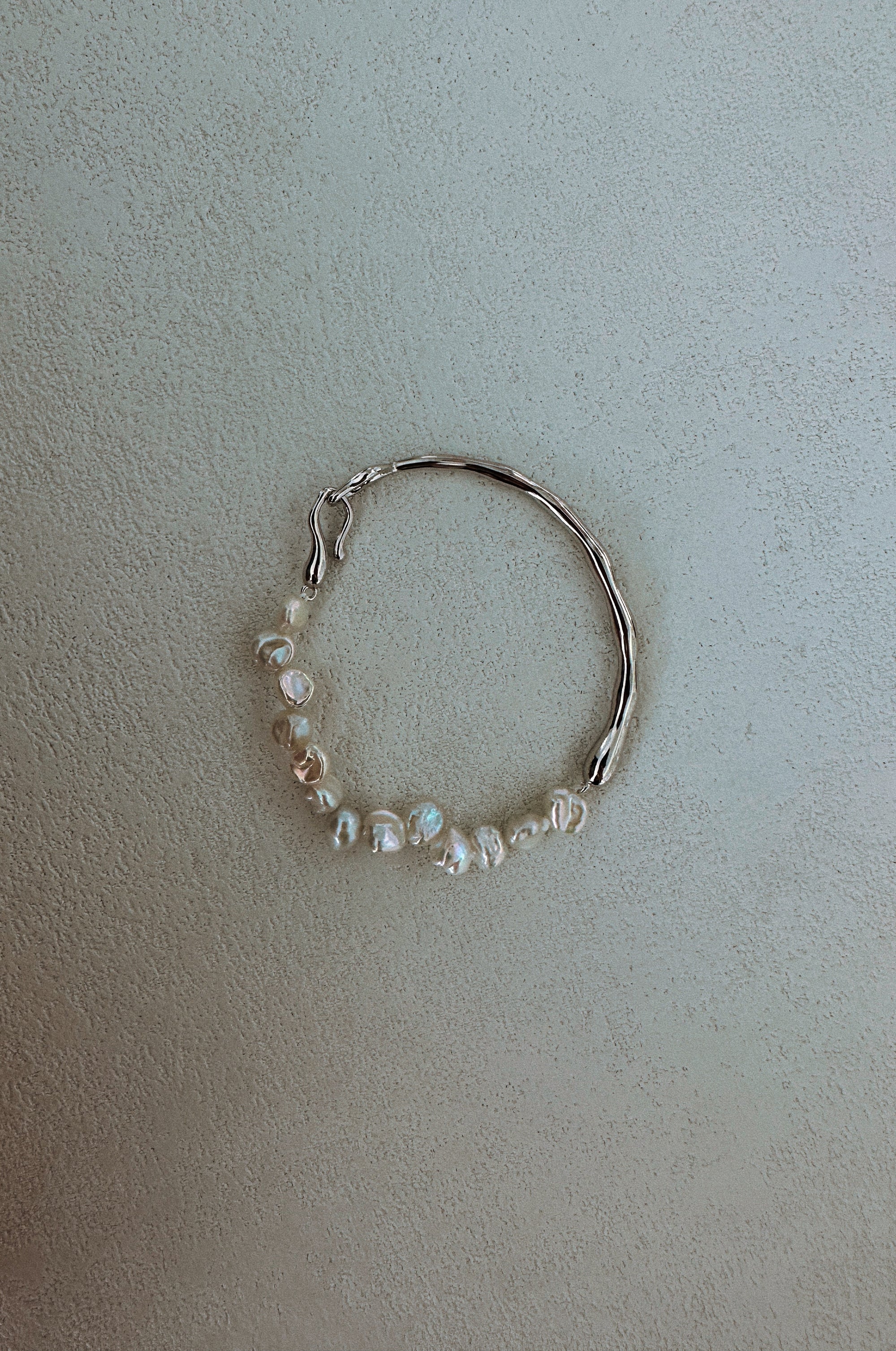 Symmetric Pearl and Silver Bracelet